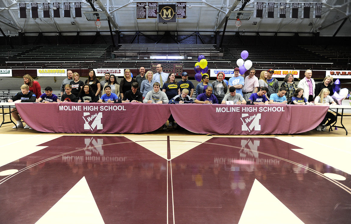 Moline has 14 sign to continue careers
